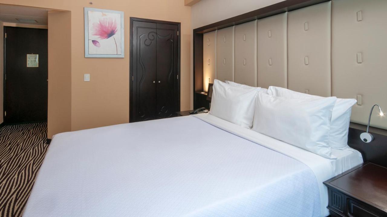 墨西哥城wtc贝莱尔独特酒店-温德姆商标精选 外观 照片 A bedroom at the hotel